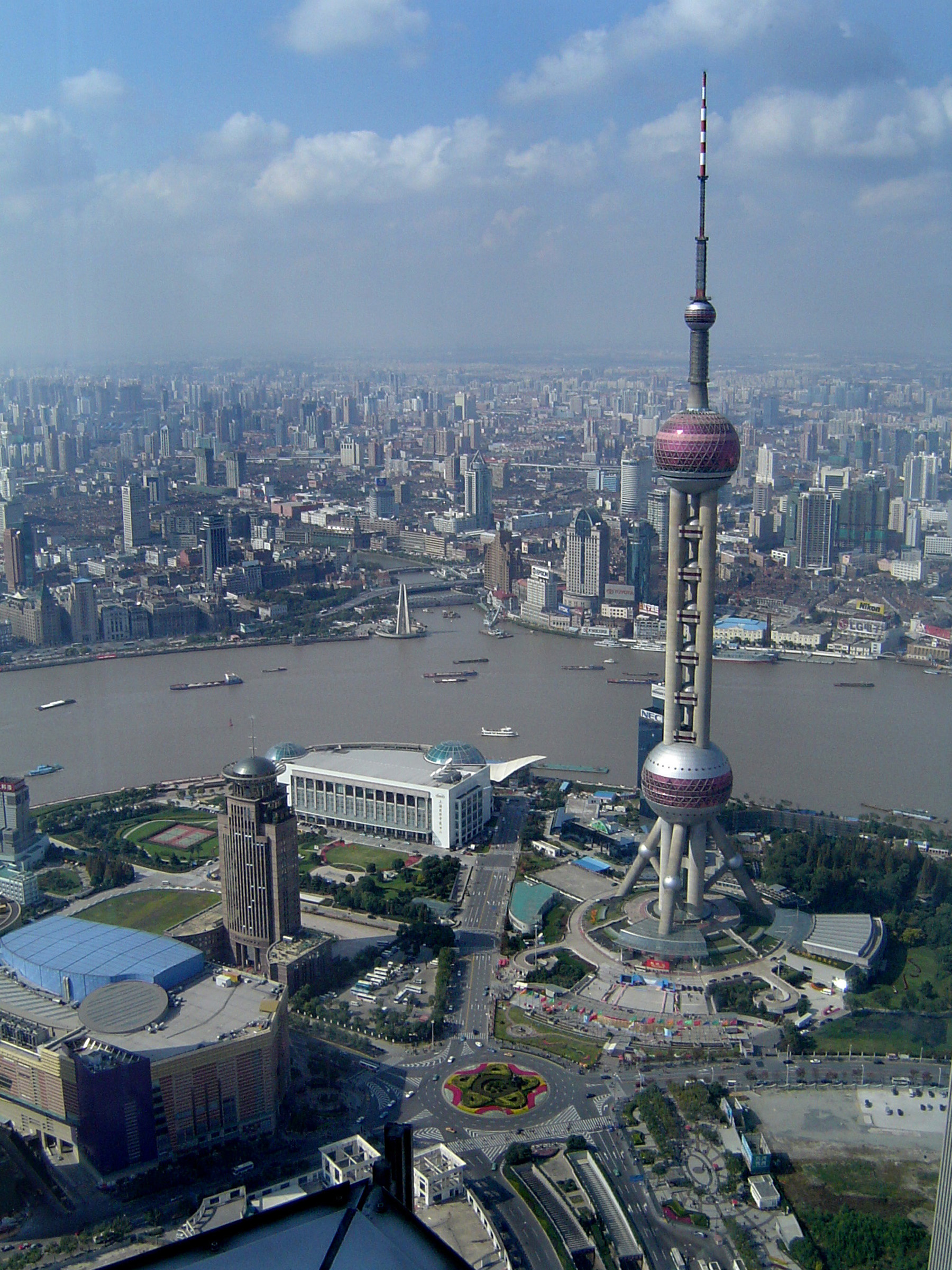 an image of Famous Architectural Oriental Pearl Tower at the City of China in Aerial View.